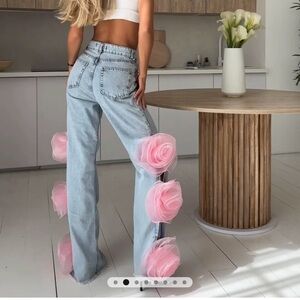 Elegant Blue Jeans with Pink Floral Accents
